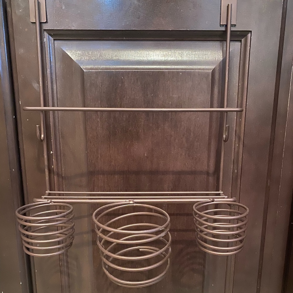 Over the door storage for hair styling tools